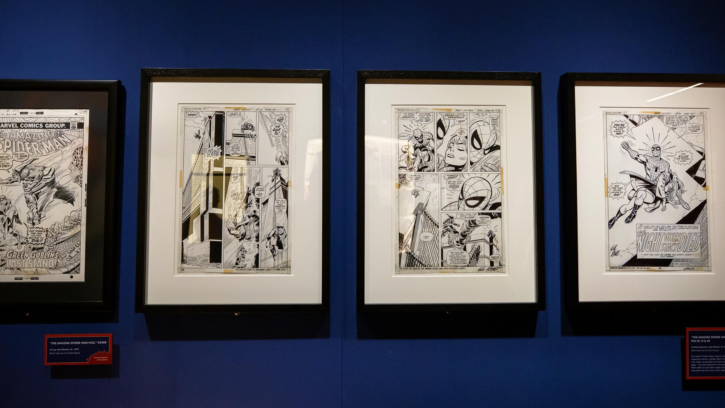 Framed comic book artwork on display