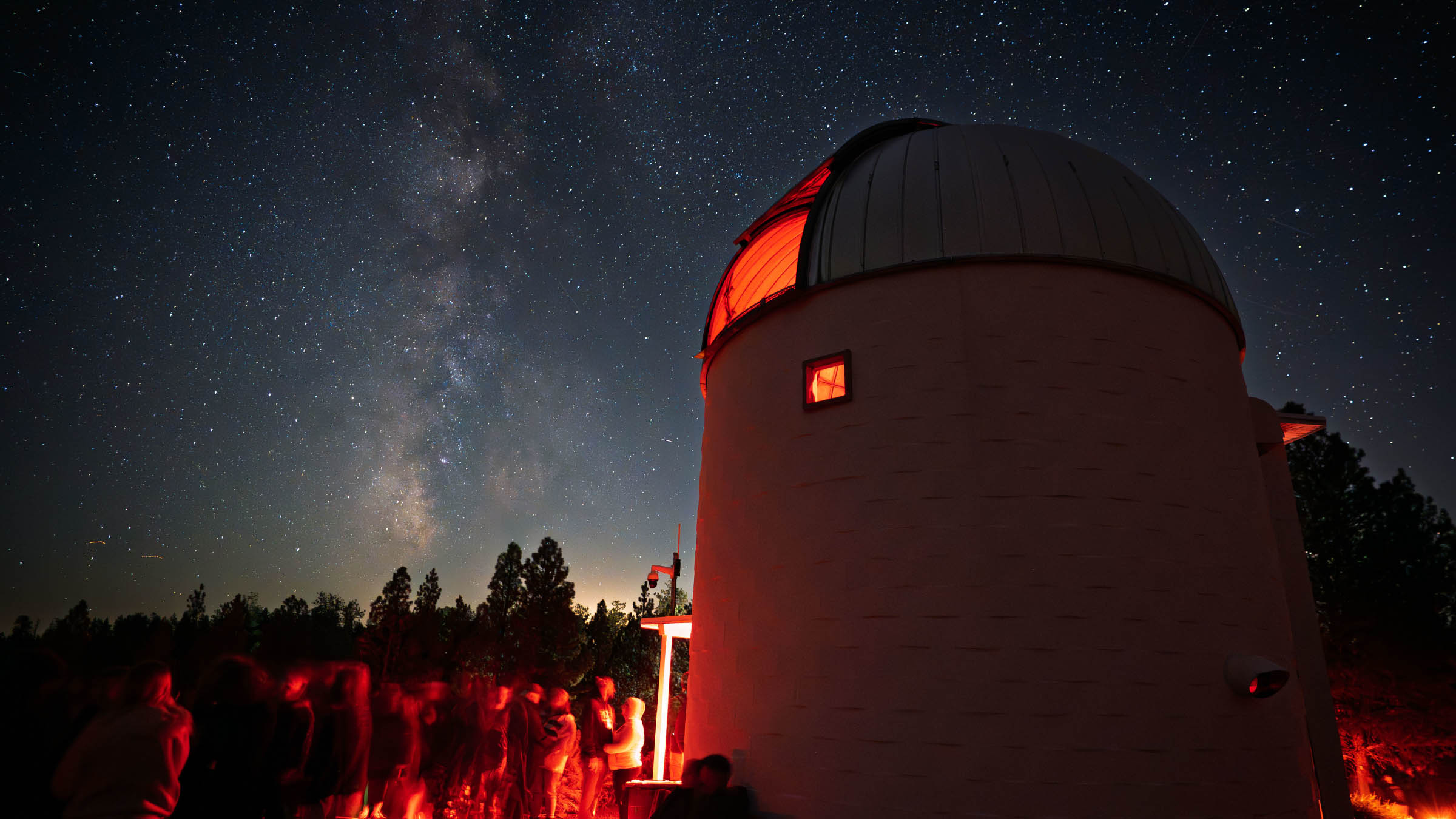 Stargazers gathered outside Pine Mountain Observatory beneath the Milky Way