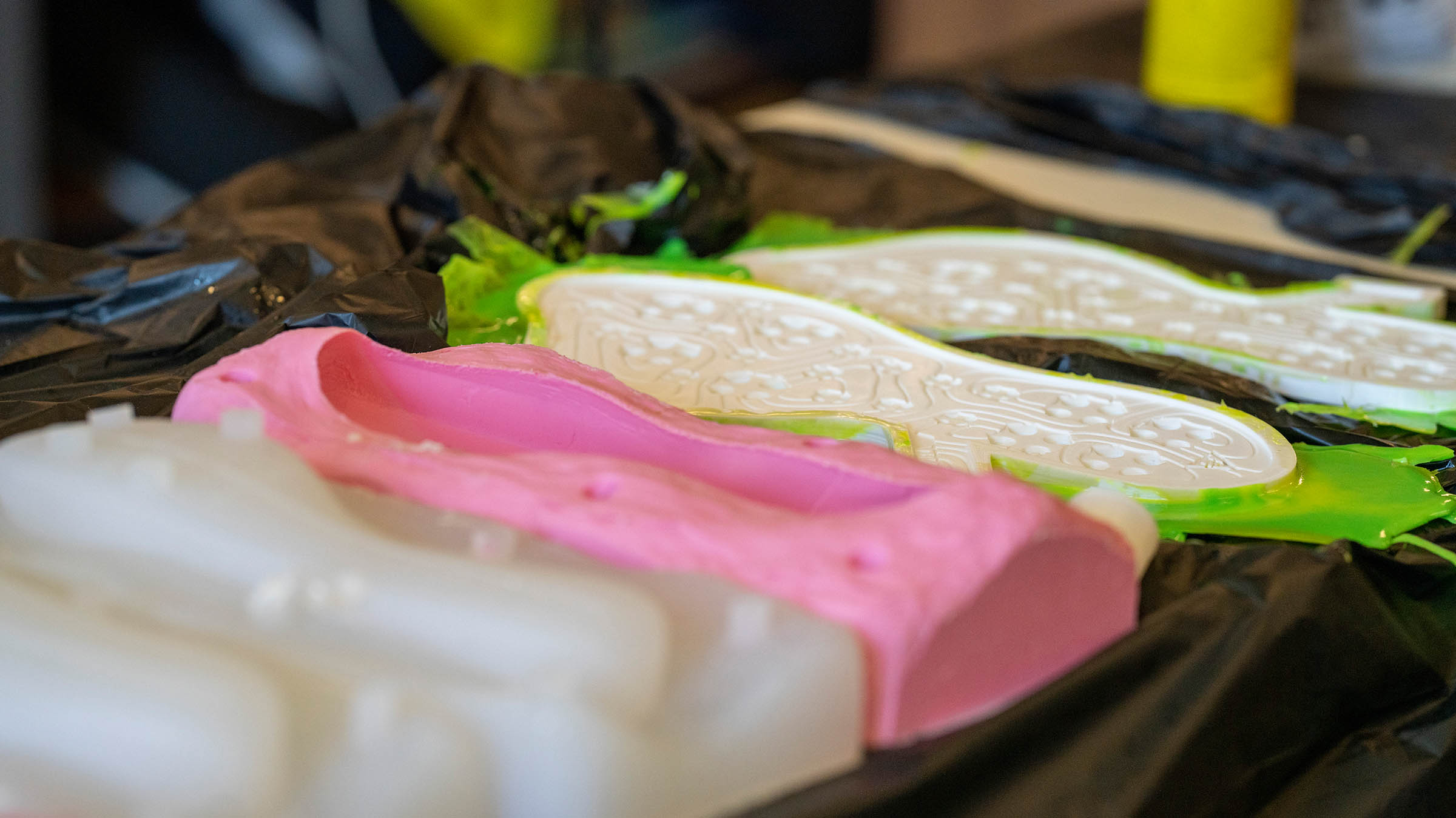 Shoe sole molds and prototype materials used in a product design materials science course
