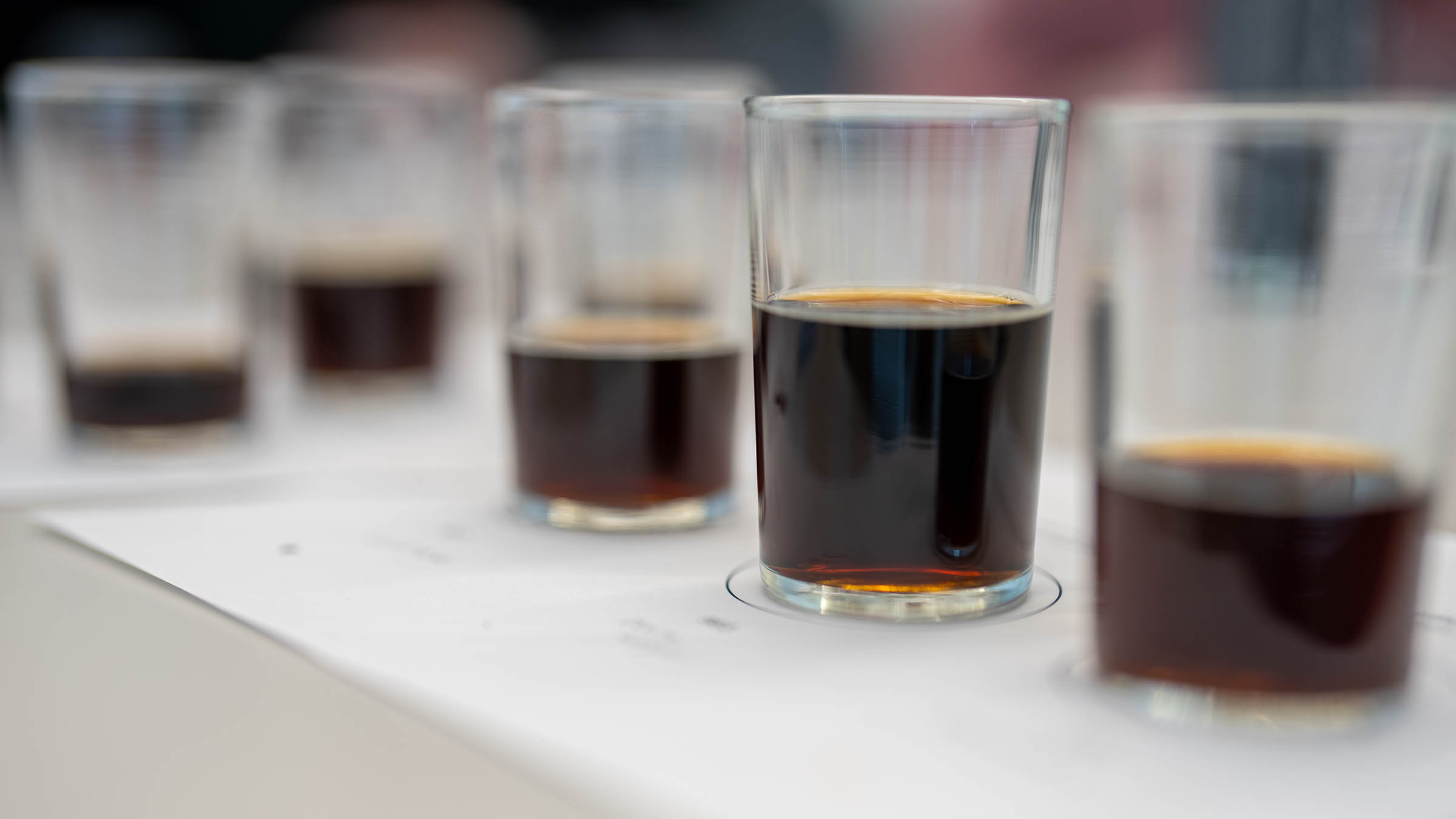 Beer samples lined up for evaluation as part of brewing innovation local brewery visit