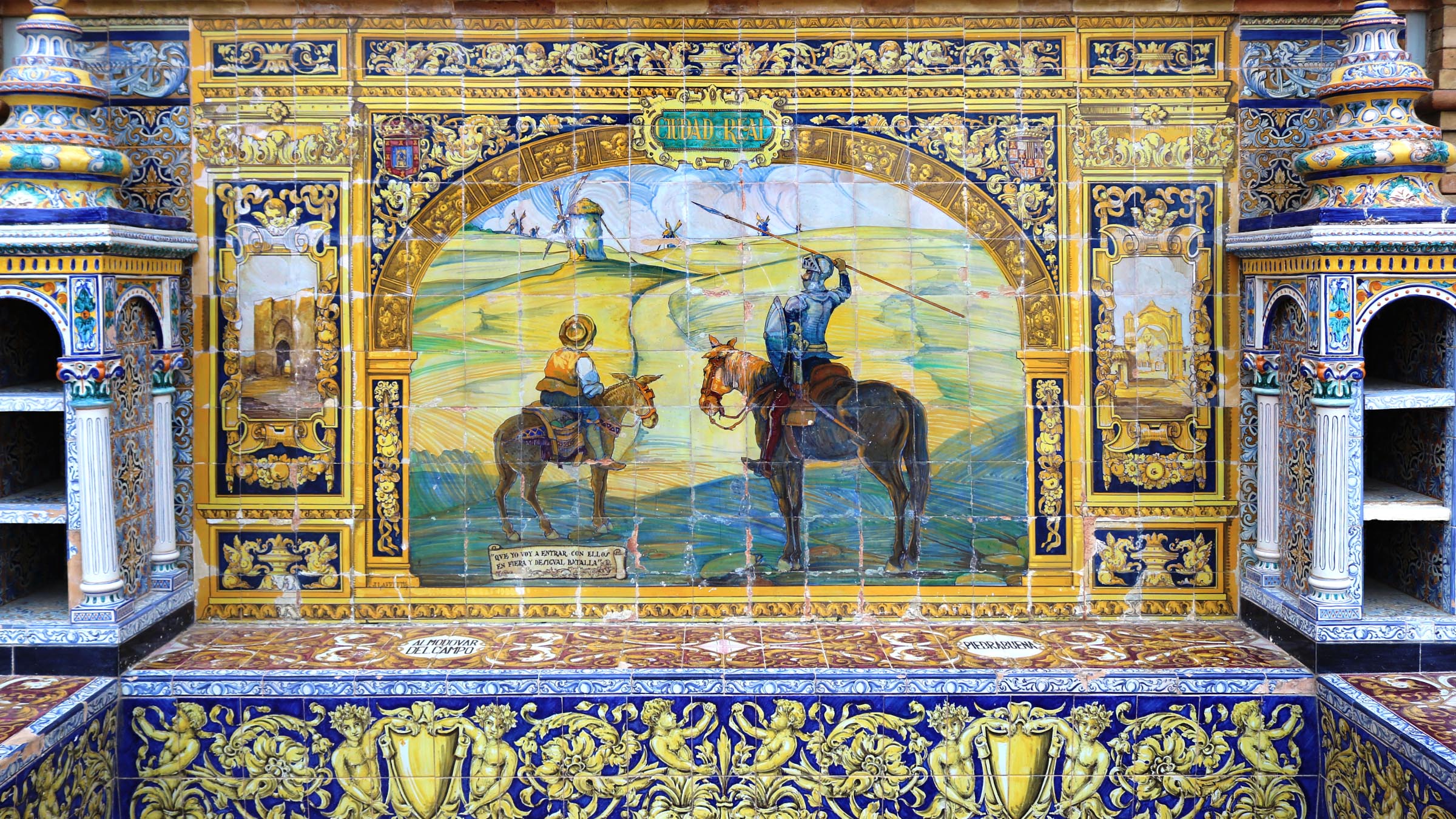 Ceramic mural depicting Don Quixote and windmills in Seville, Spain