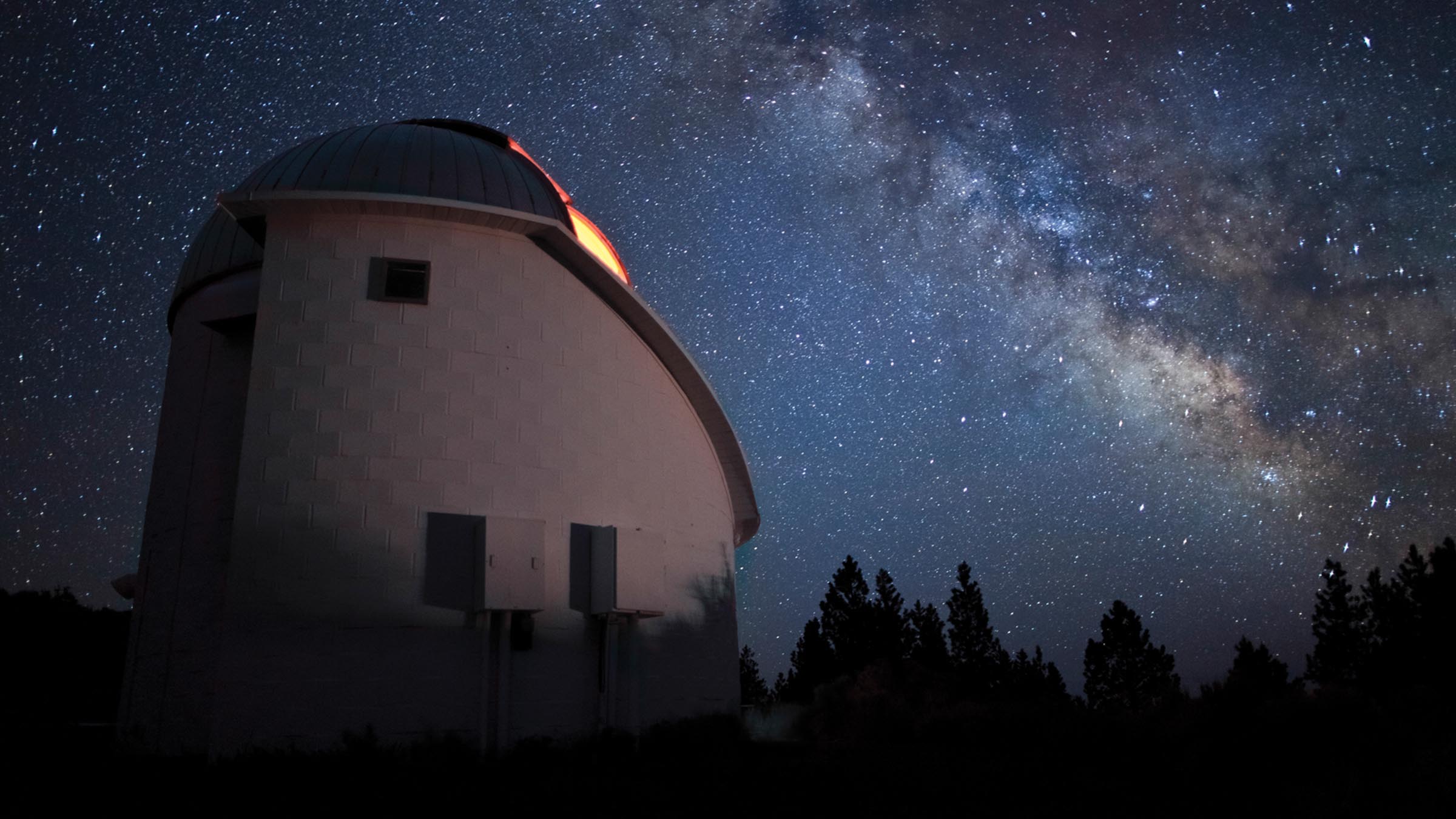 Pine Mountain Observatory beneath the Milky Way on a clear, star-filled night
