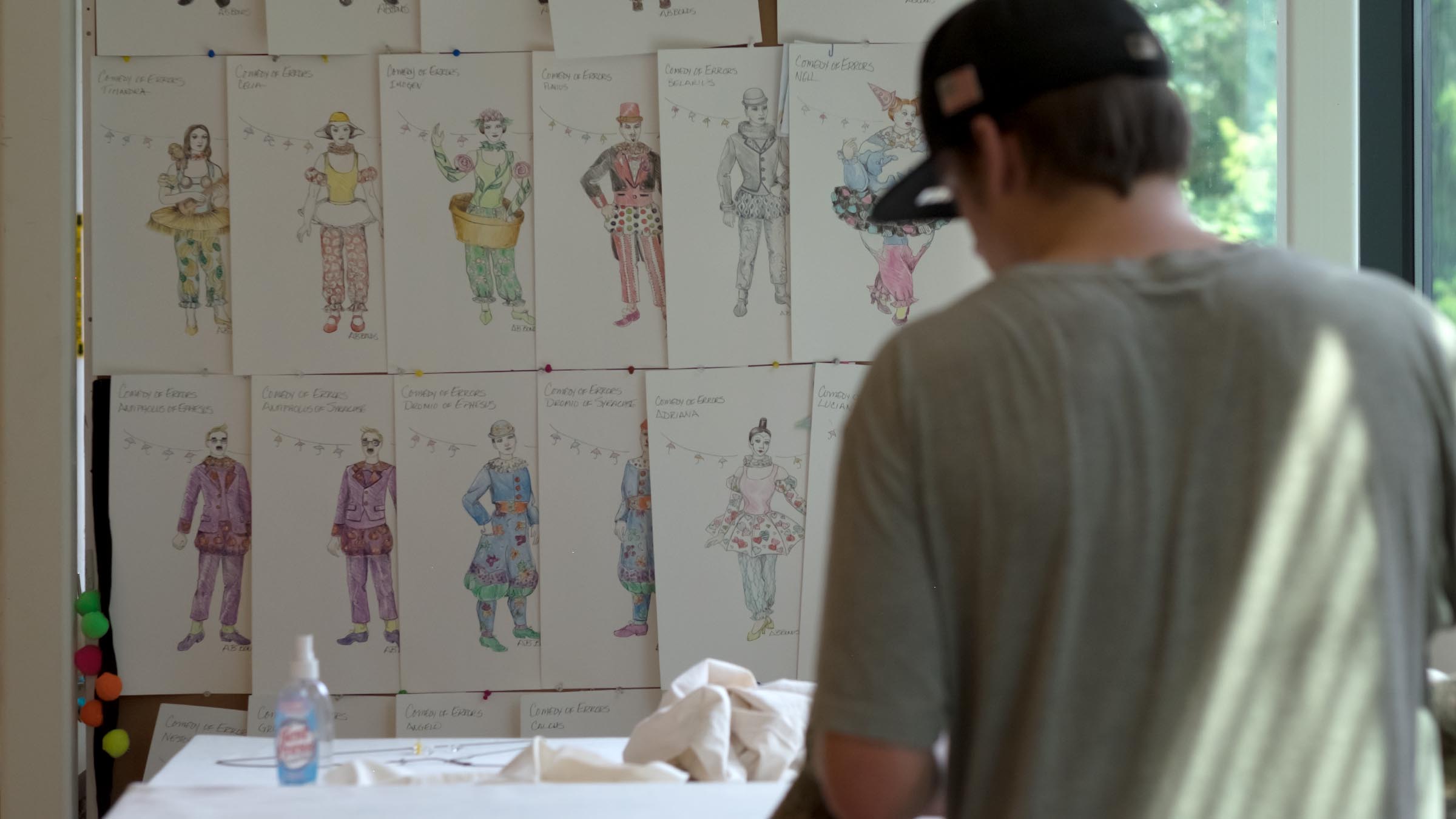 Student in the studio creating costumes for a production of The Comedy of Errors