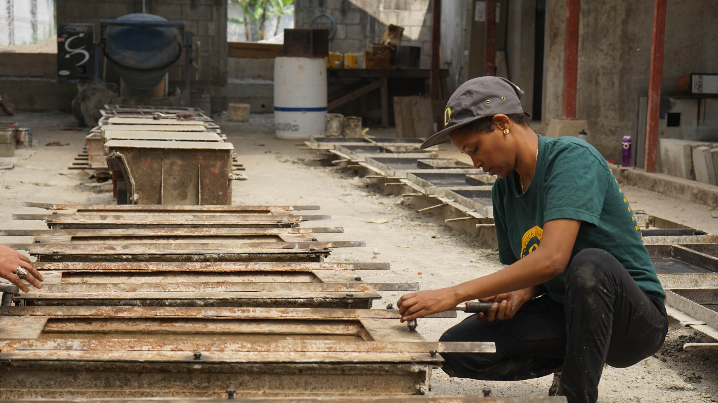 Student building stoves in Guatemala