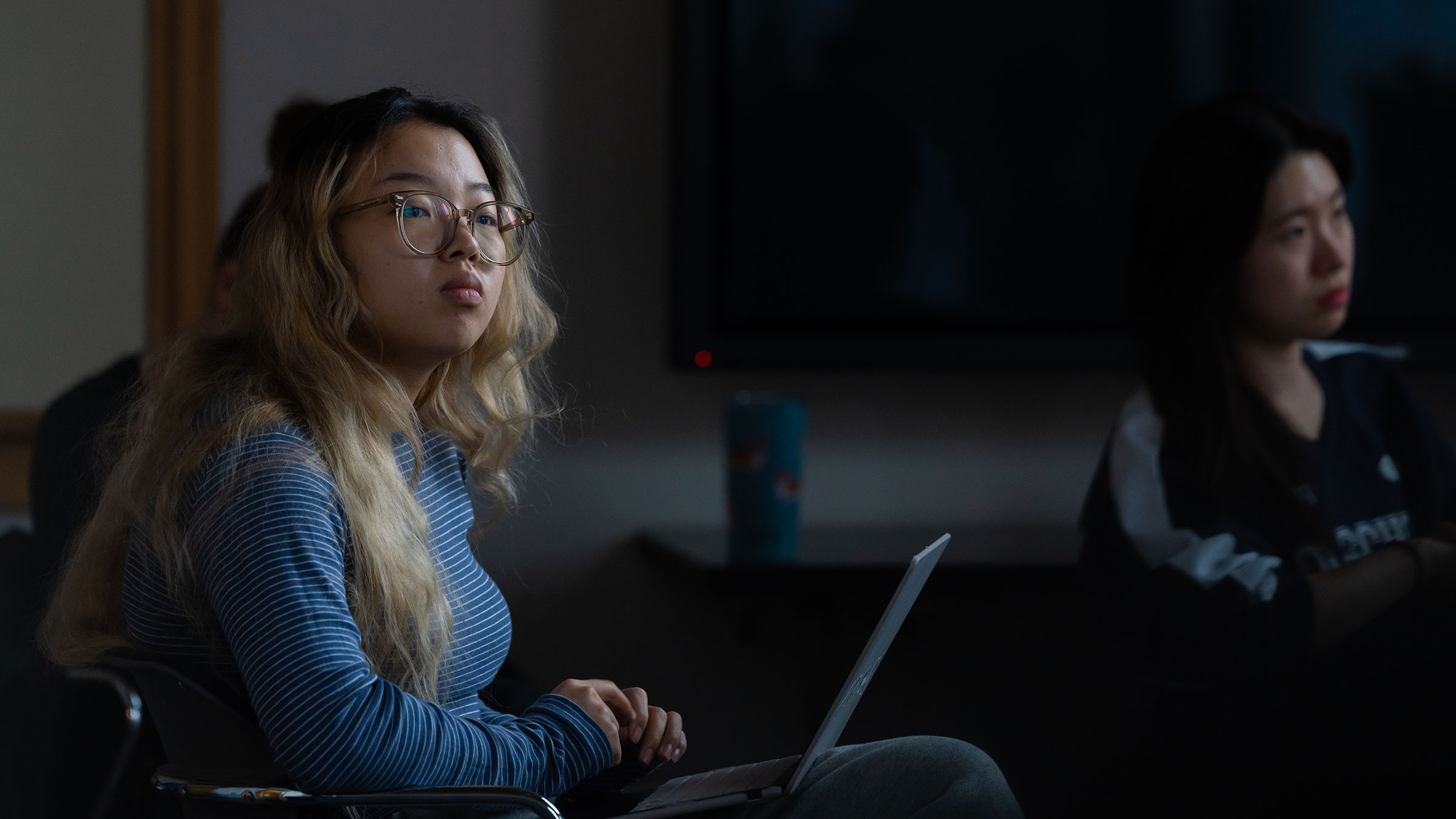 Student listening attentively during a computer science class